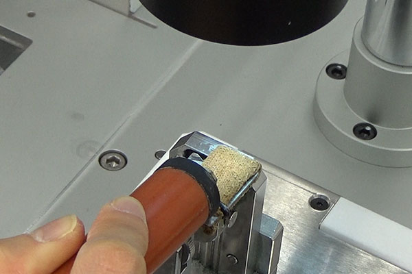 A non-harmful liquid is needed when performing surface treatment when preparing cross-sectional samples
